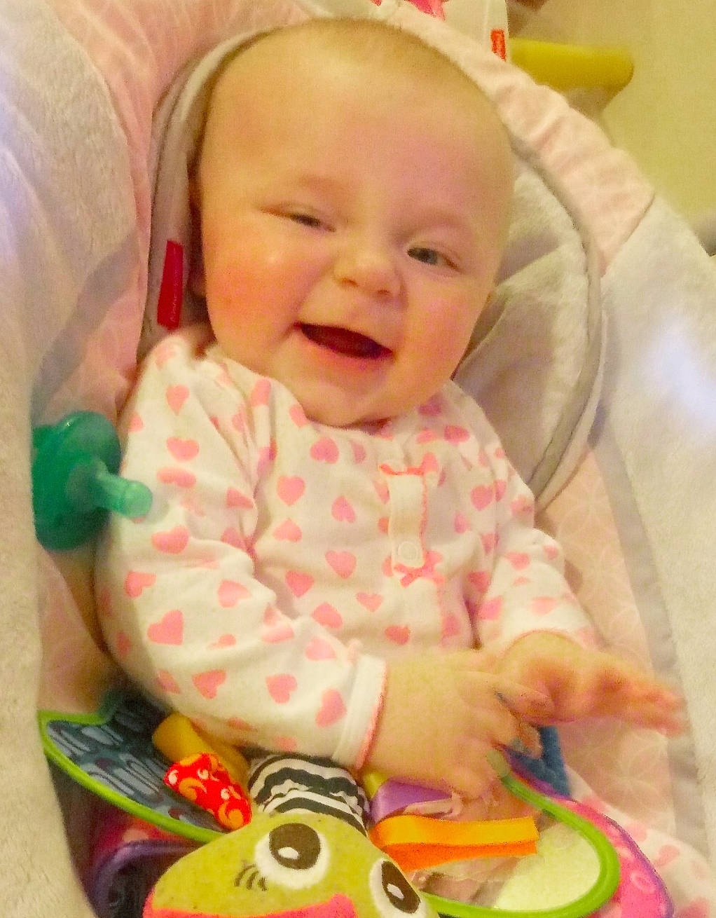 Paisley is registered to the contest to win money with this photo: baby, baby_playing_with_toys, baby_products, baby_toys, cheek, child, facial_expression, head, lip, nose, person, play, product, skin, smile, toddler, toy, tummy_time