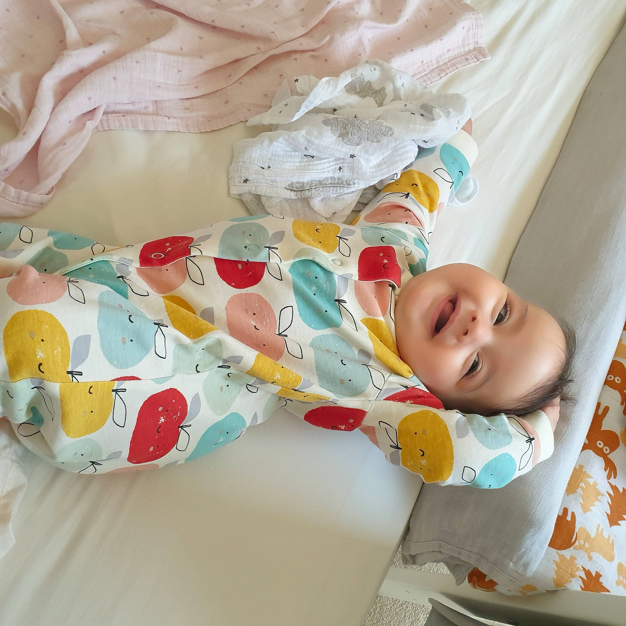 Beatrice Helen Rose is registered to the contest to win money with this photo: baby, baby_products, baby_toddler_clothing, bedding, child, comfort, dress, embellishment, fashion_accessory, happy, head, joy, linens, pattern, peach, person, room, sleeve, smile, textile