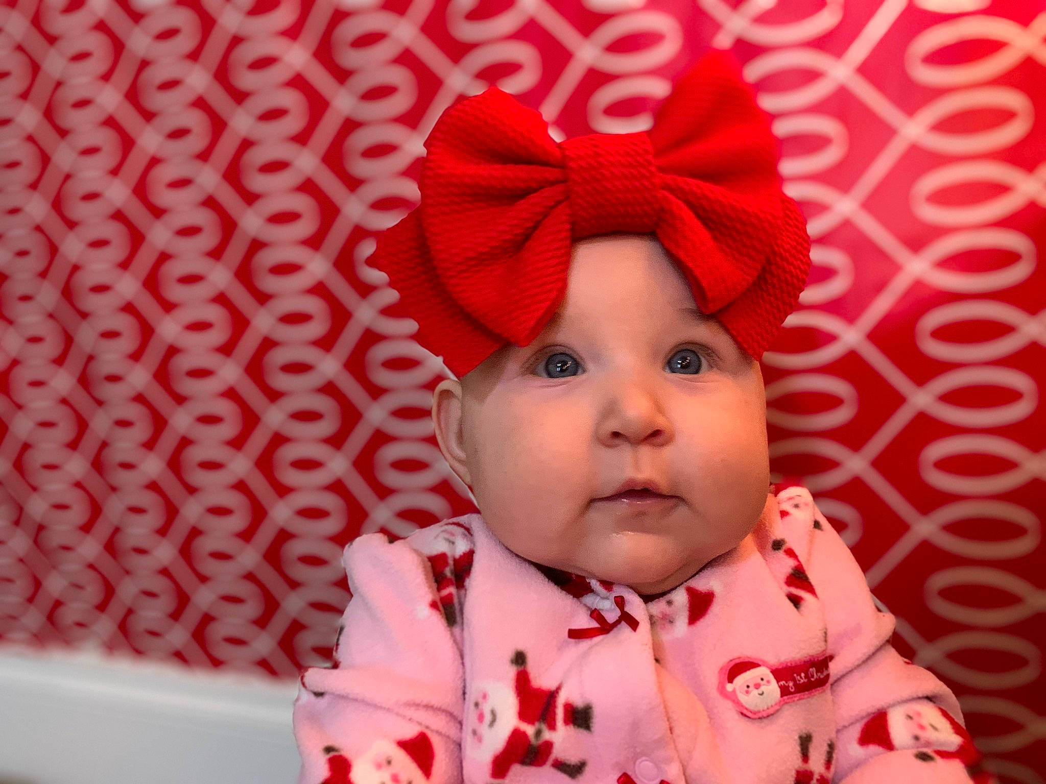 Hazel Mae joined the competition — help win amazing prizes! baby, baby_toddler_clothing, bonnet, cheek, child, child_model, costume, costume_accessory, costume_hat, headgear, headwear, lip, party_supply, pattern, person, pink, pleased, red, textile, toddler