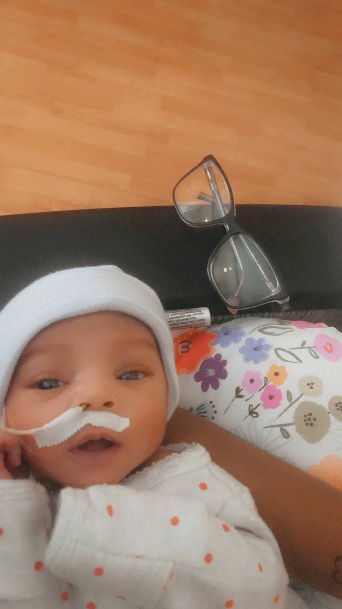 Avani is registered to the contest to win money with this photo: baby, baby_products, baby_sleeping, baby_toddler_clothing, beanie, cap, cheek, child, comfort, eye_glass_accessory, eyewear, fashion_accessory, goggles, linens, person, personal_protective_equipment, room, skin, smile, toddler