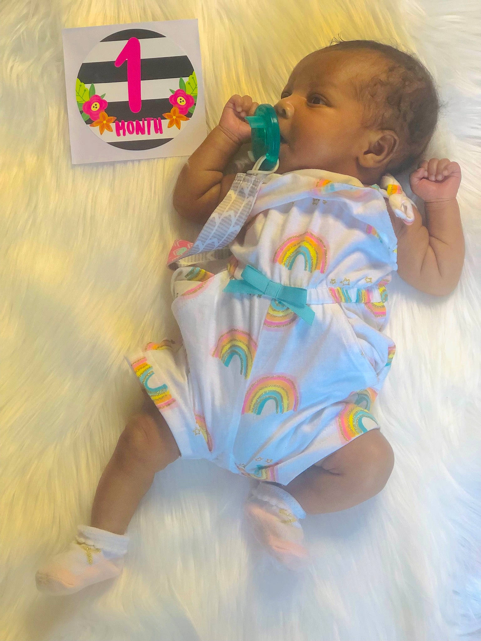 Avani is registered to the contest to win money with this photo: baby, baby_toddler_clothing, cheek, comfort, dress, face, facial_expression, finger, fun, happy, head, human_body, iris, mouth, nose, organ, person, skin, sleeve, t_shirt