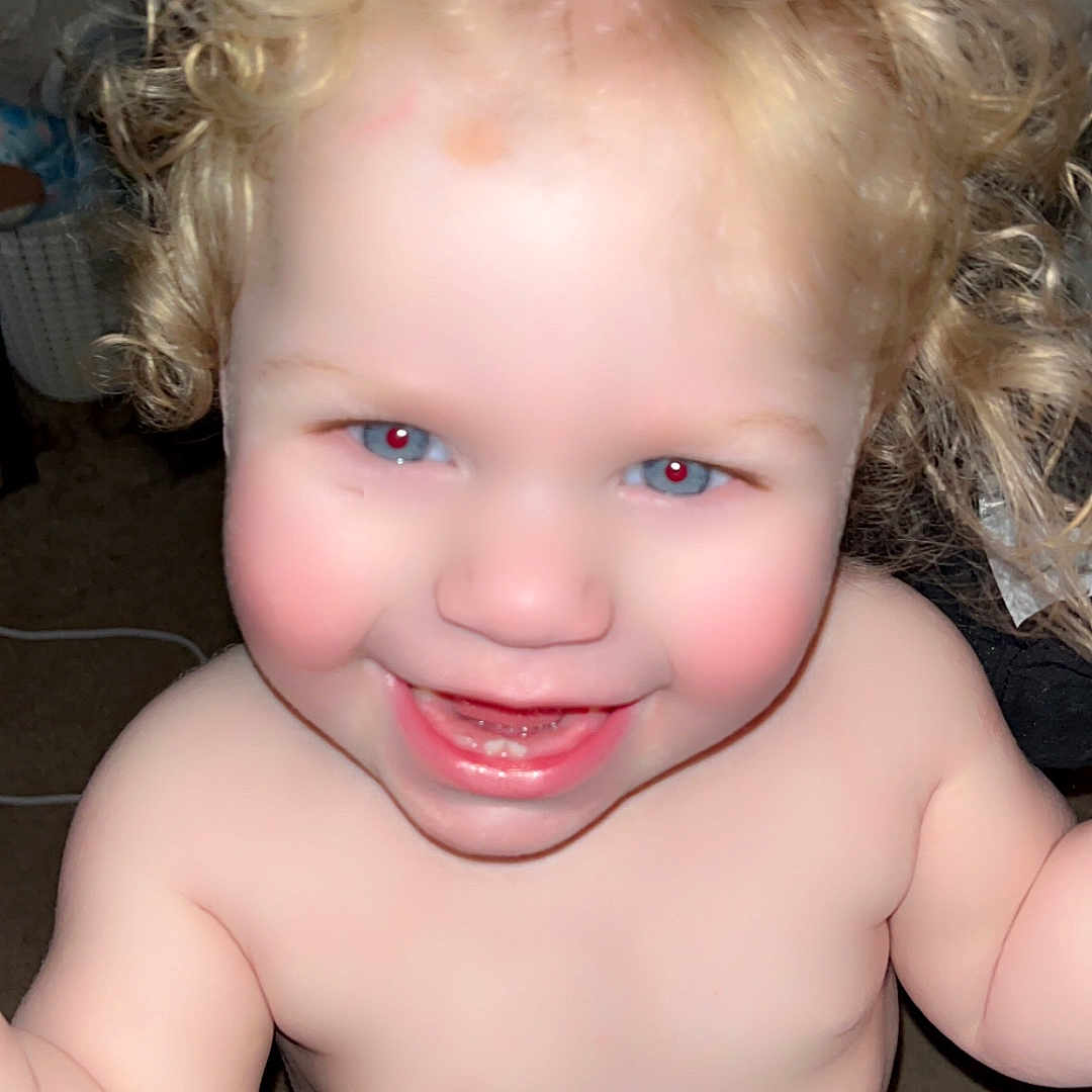 Jeremiah Cox joined the competition — help win amazing prizes! toddler, child, smiling, curly_hair, blonde_hair, blue_eyes, bare_chest, standing, indoor, carpet, happy, cute, red_eye, heart_overlay, baby, person, young_child, skin, playful, closeup