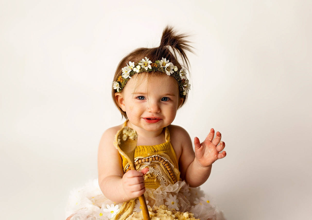River is registered to the contest to win money with this photo: baby_toddler_clothing, child, costume, day_dress, event, eyelash, fashion_accessory, fashion_design, flash_photography, fun, hair_accessory, happy, headband, headgear, headpiece, headwear, jewellery, joy, peach, person