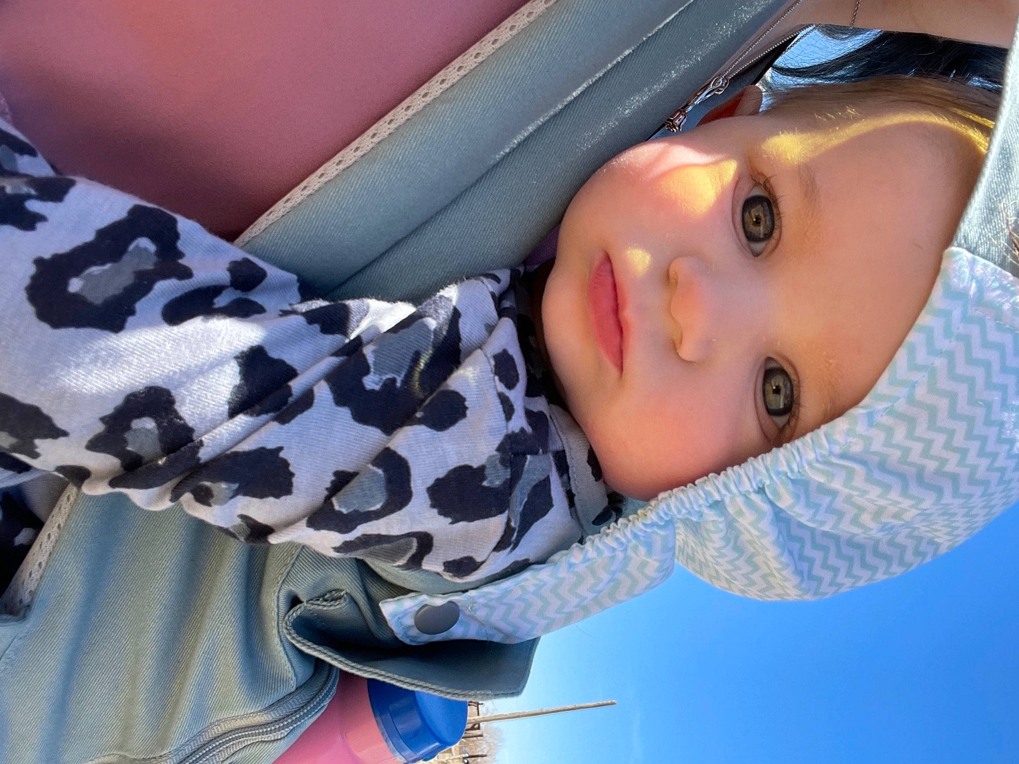 Octavia is registered to the contest to win money with this photo: baby, baby_toddler_clothing, cheek, child, comfort, cool, electric_blue, eyelash, facial_expression, hairstyle, headwear, lip, mammal, nose, person, skin, sleeve, textile, toddler, tree