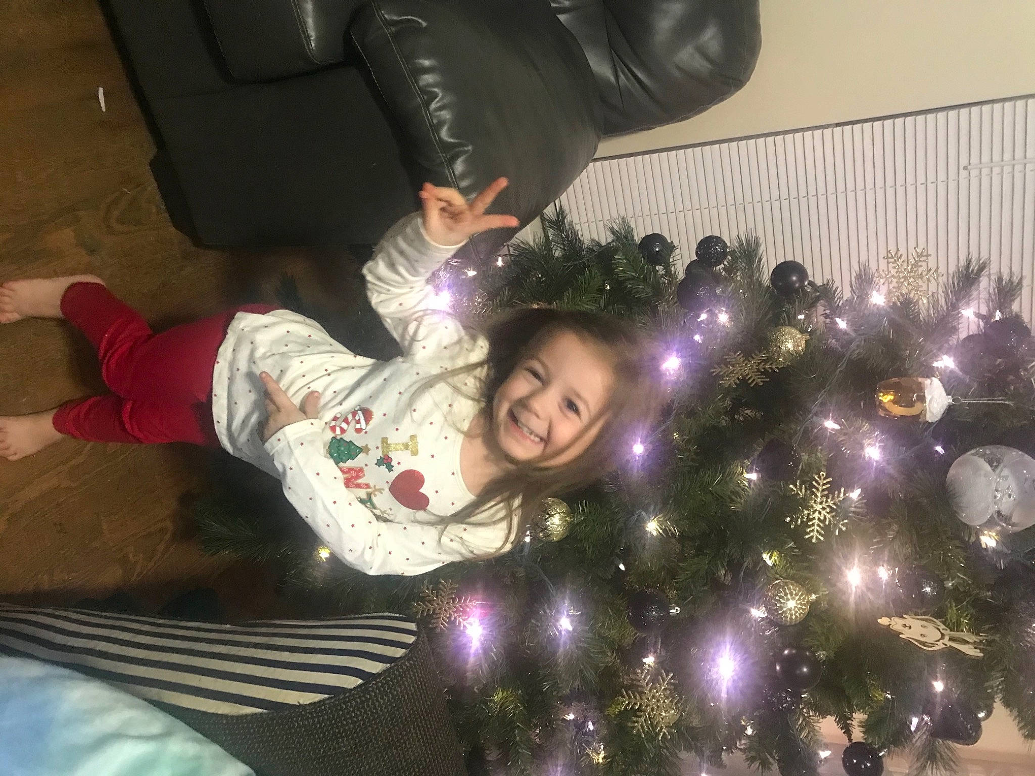 Phoebe joined the competition — help win amazing prizes! child, christmas_decoration, christmas_eve, christmas_ornament, christmas_tree, event, evergreen, fun, happy, holiday, holiday_ornament, house, joy, organ, ornament, party_supply, person, pink, plant, purple