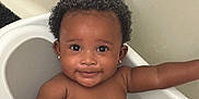 Kai'Loni joined the competition — help win amazing prizes! baby, bathtub, bathroom, child, cute, curly_hair, earrings, face, happy, infant, inside, person, portrait, skin, smile, water, wet, young_child, toddler, arm
