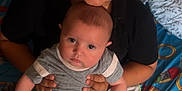 Asher joined the competition — help win amazing prizes! child, baby, siblings, smiling, indoor, bed, pillow, blanket, mittens, boy, cute, holding, happy, portrait, family, love, heart, sparkles, clothing, floor