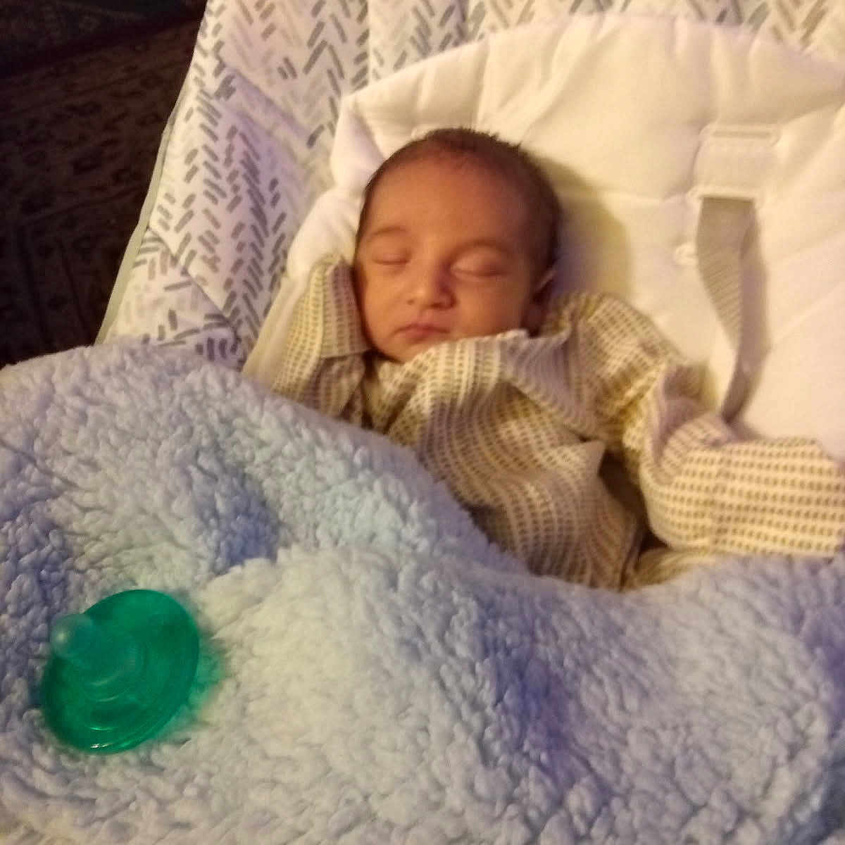 Rene is registered to the contest to win money with this photo: baby, baby_seat, blanket, child, clothing, comfort, cozy, cushion, cute, indoors, infant, nap, newborn, pacifier, peaceful, portrait, relaxation, resting, sleeping, soft_texture