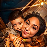 King is registered to the contest to win money with this photo: woman, child, hugging, tattoos, smile, portrait, indoor, closeup, family, love, affection, skin, hair, person, face, arm, lighting, casual, warmth, togetherness