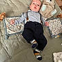 Charly a rejoint le concours — aidez-le/la à gagner de superbes lots ! baby, infant, child, suspenders, striped_socks, plush_toy, quilted_mat, floor, pillow, clothing, person, cute, indoor, soft_toy, face, head, lying_down, expression, comfort, home