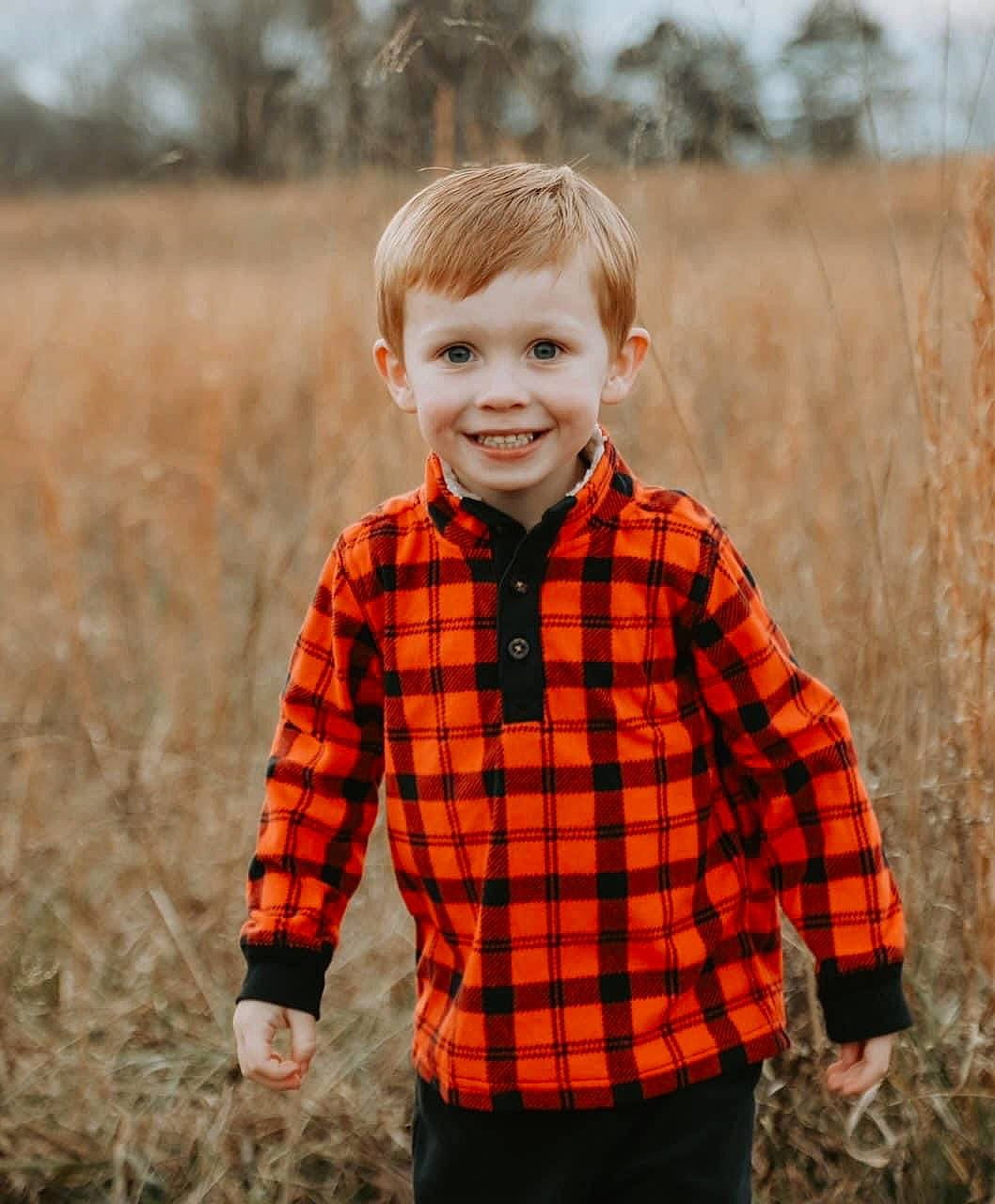 Keegan joined the competition — help win amazing prizes! collar, dress_shirt, face, flash_photography, grass, grassland, hair, happy, head, joy, landscape, orange, pattern, people_in_nature, person, plaid, plant, sleeve, smile, tartan