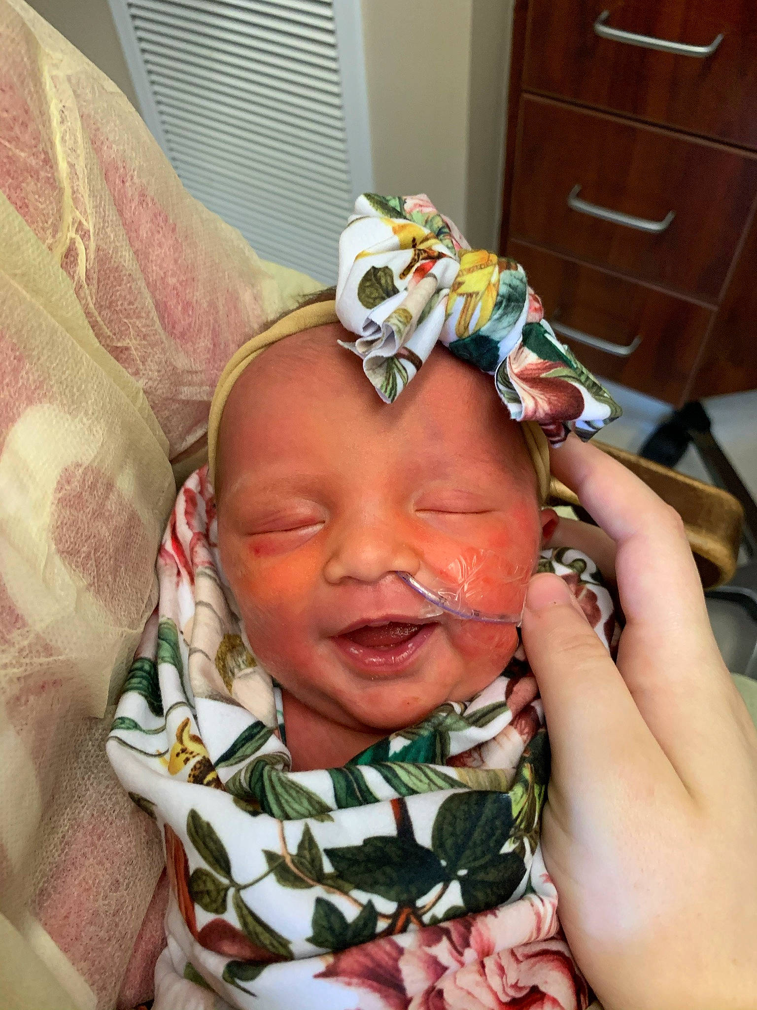 Brighton is registered to the contest to win money with this photo: baby, baby_products, baby_toddler_clothing, cabinetry, cheek, chest, chest_of_drawers, chiffonier, child, drawer, dresser, nail, person, pink, sideboard, skin, toddler, window_blind, window_covering, window_treatment