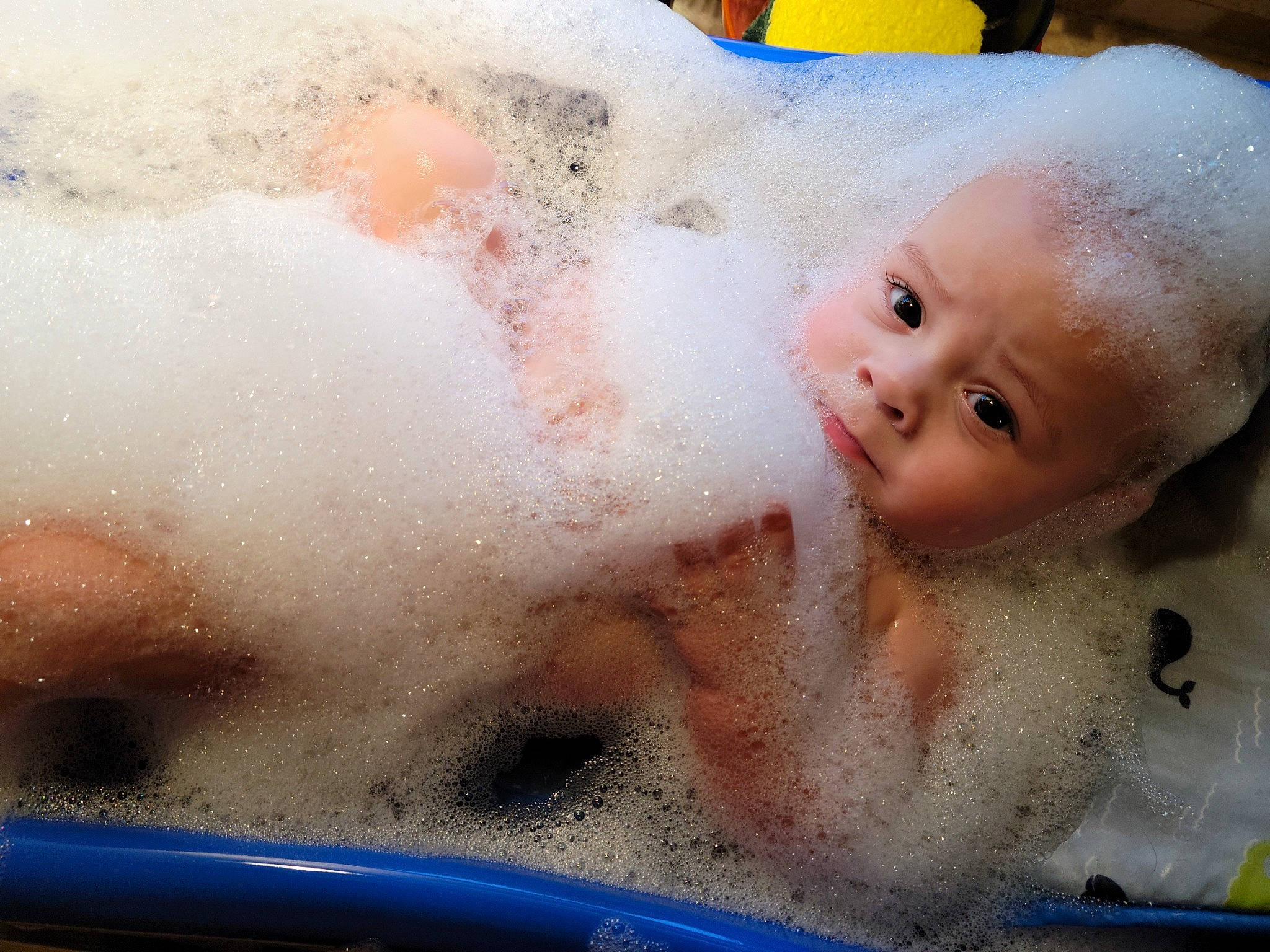 Rekkr is registered to the contest to win money with this photo: baby, baby_bathing, bathing, child, foam, nose, person, toddler, washing
