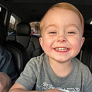 Grayson joined the competition — help win amazing prizes! child, smiling, face, toddler, happy, car_interior, seat, clothing, short_hair, person, window, daylight, seatbelt, casual, portrait, young_child, human, childhood, joy, indoors
