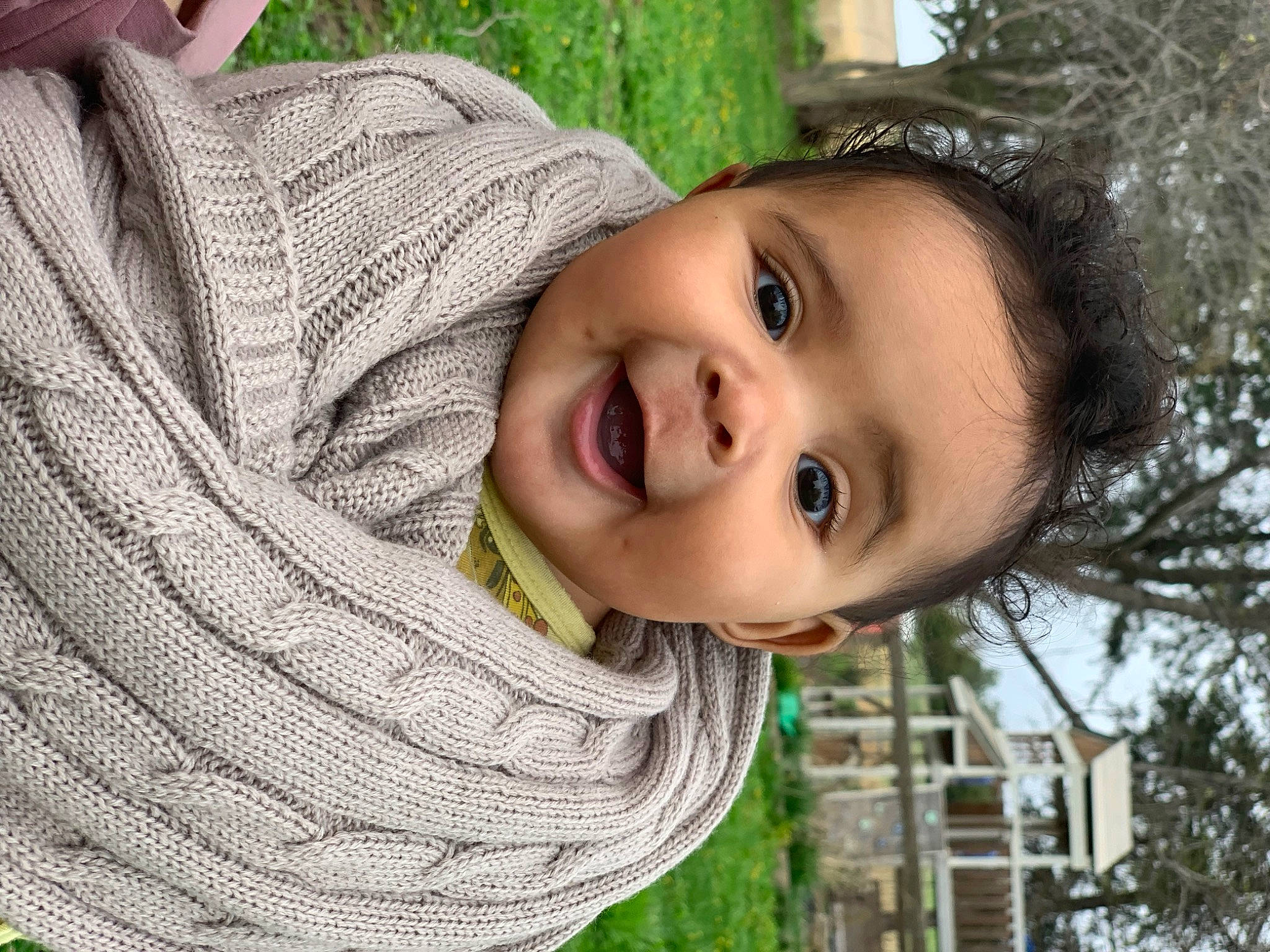 Marina is registered to the contest to win money with this photo: adaptation, chin, cool, grass, green, happy, human, human_body, iris, leisure, lip, nose, organ, people_in_nature, person, plant, skin, smile, toddler, tree