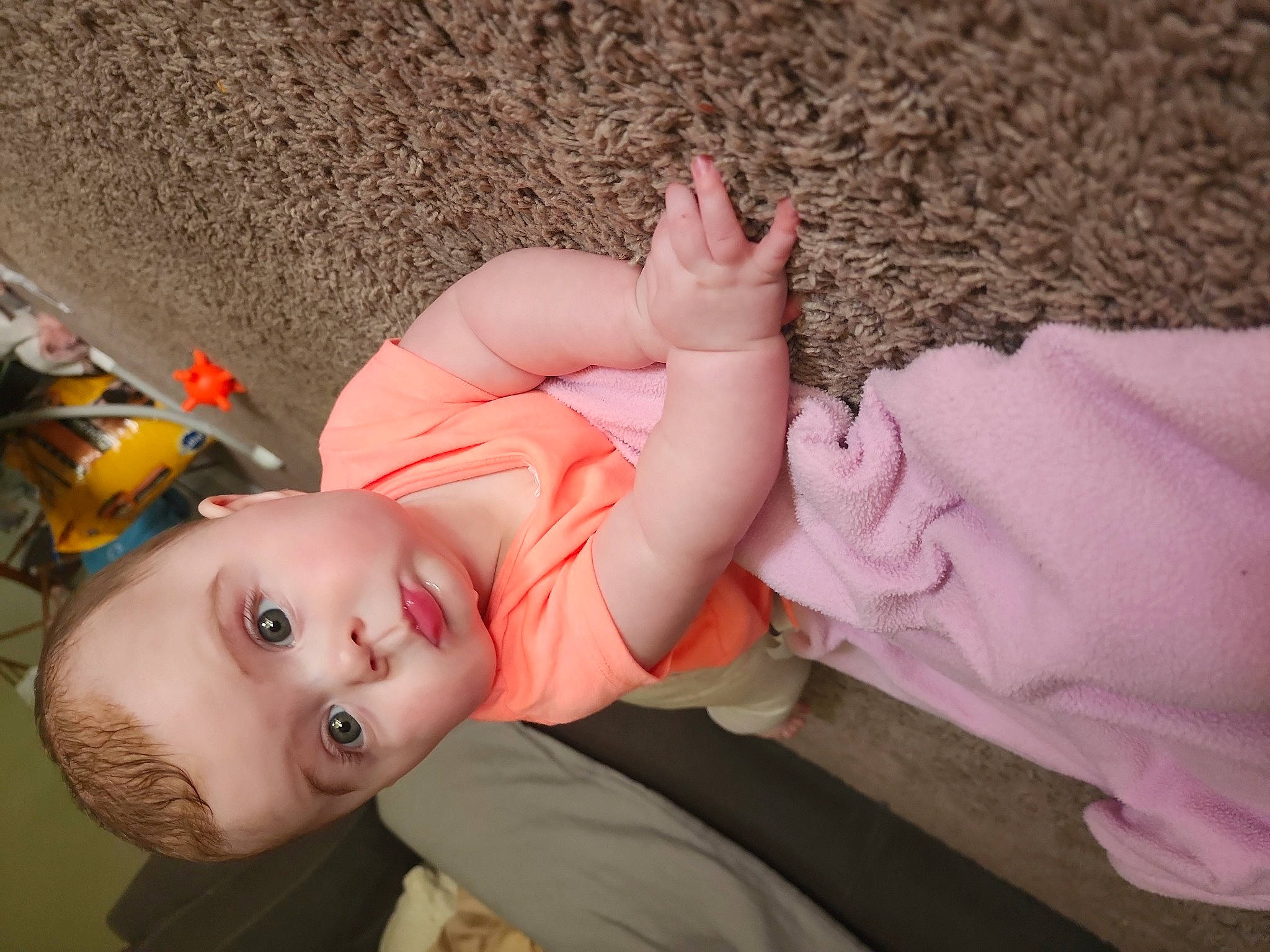 Harley is registered to the contest to win money with this photo: arm, doll, dress, eyelash, gesture, grass, happy, head, headgear, human_body, joint, leg, lip, mouth, person, pink, plant, skin, surprise, toddler