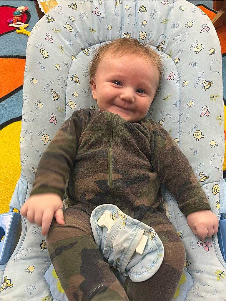 Bruce joined the competition — help win amazing prizes! baby, baby_toddler_clothing, cheek, child, comfort, eye, facial_expression, head, joy, linens, organ, pattern, person, photograph, product, sitting, skin, sleeve, smile, textile