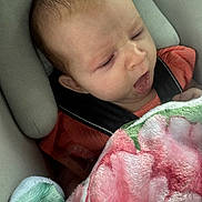Victoria is registered to the contest to win money with this photo: baby, blanket, car_seat, child, cute, expression, face, furniture, infant, indoors, person, pink, portrait, resting, sleepy, soft, toddler, wearing, young, yawn