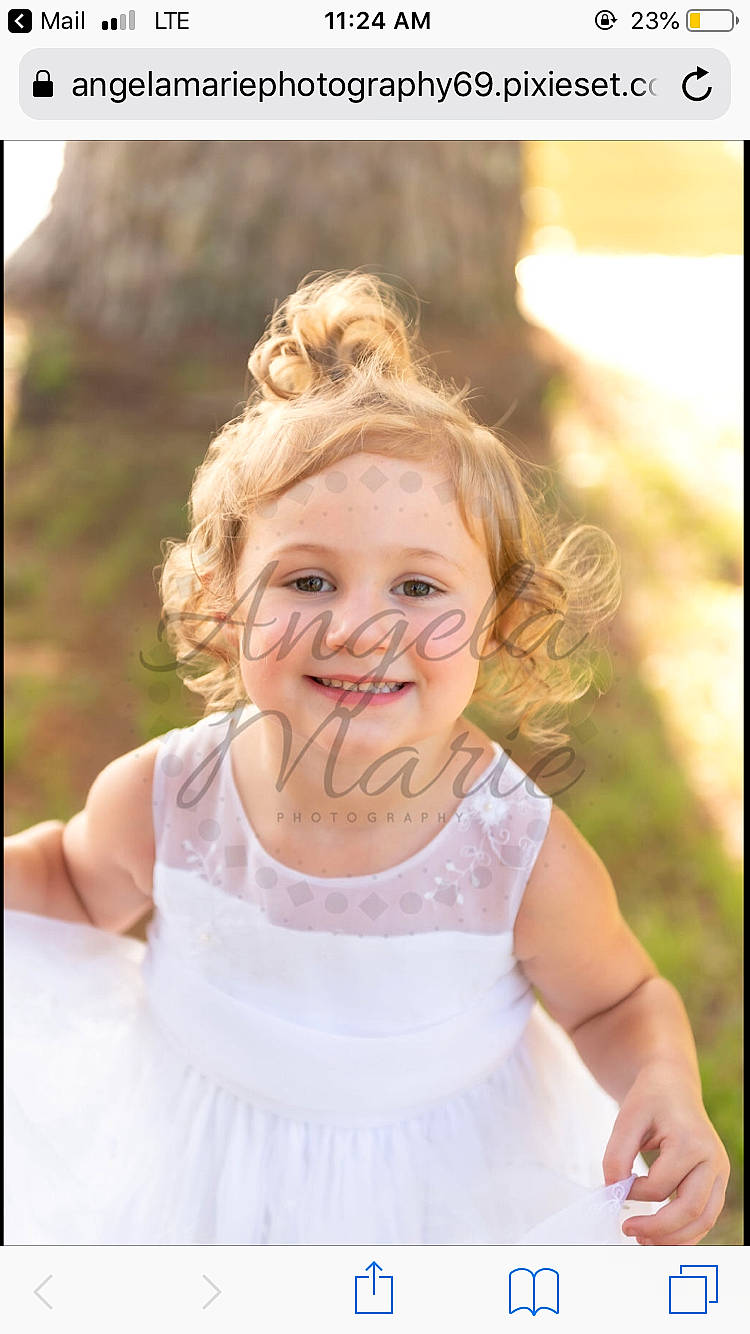 Dixie is registered to the contest to win money with this photo: baby, blond, child, child_model, dress, facial_expression, gesture, hair_accessory, happy, joy, laugh, person, photograph, photography, portrait, portrait_photography, skin, smile, stock_photography, toddler