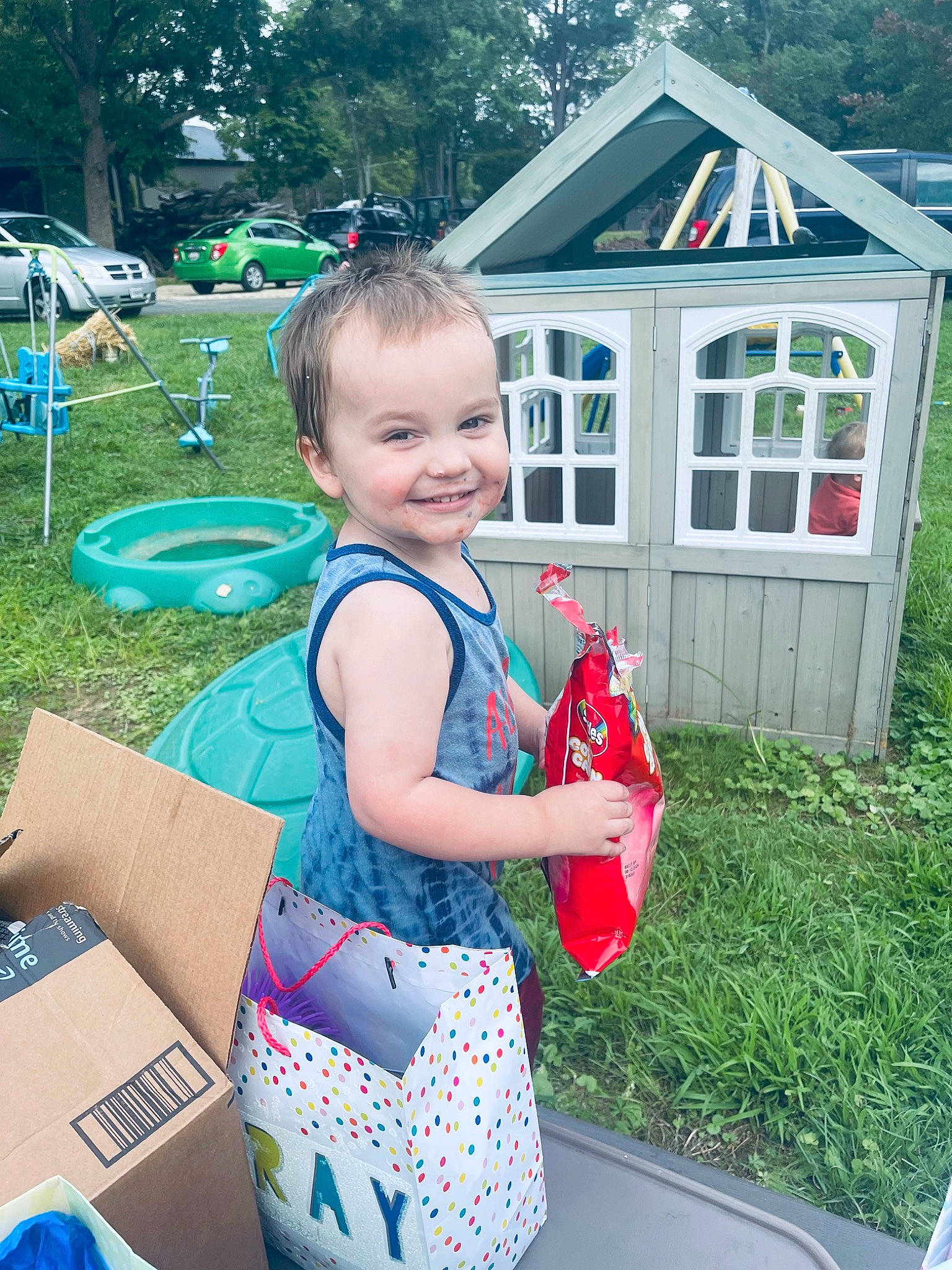John is registered to the contest to win money with this photo: blue, child, electric_blue, event, fun, garden_buildings, grass, happy, house, joy, leisure, person, plant, play, public_space, recreation, smile, summer, t_shirt, toddler