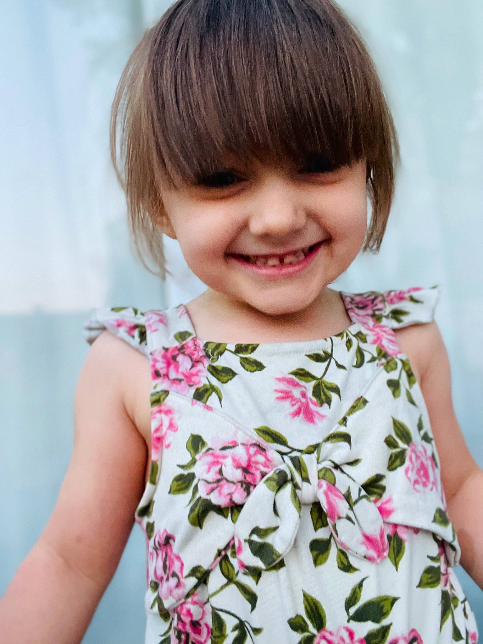 Leanna is registered to the contest to win money with this photo: baby_toddler_clothing, bangs, child, collar, day_dress, eyelash, face, facial_expression, happy, joy, magenta, neck, pattern, person, pink, portrait_photography, skin, sleeve, smile, t_shirt