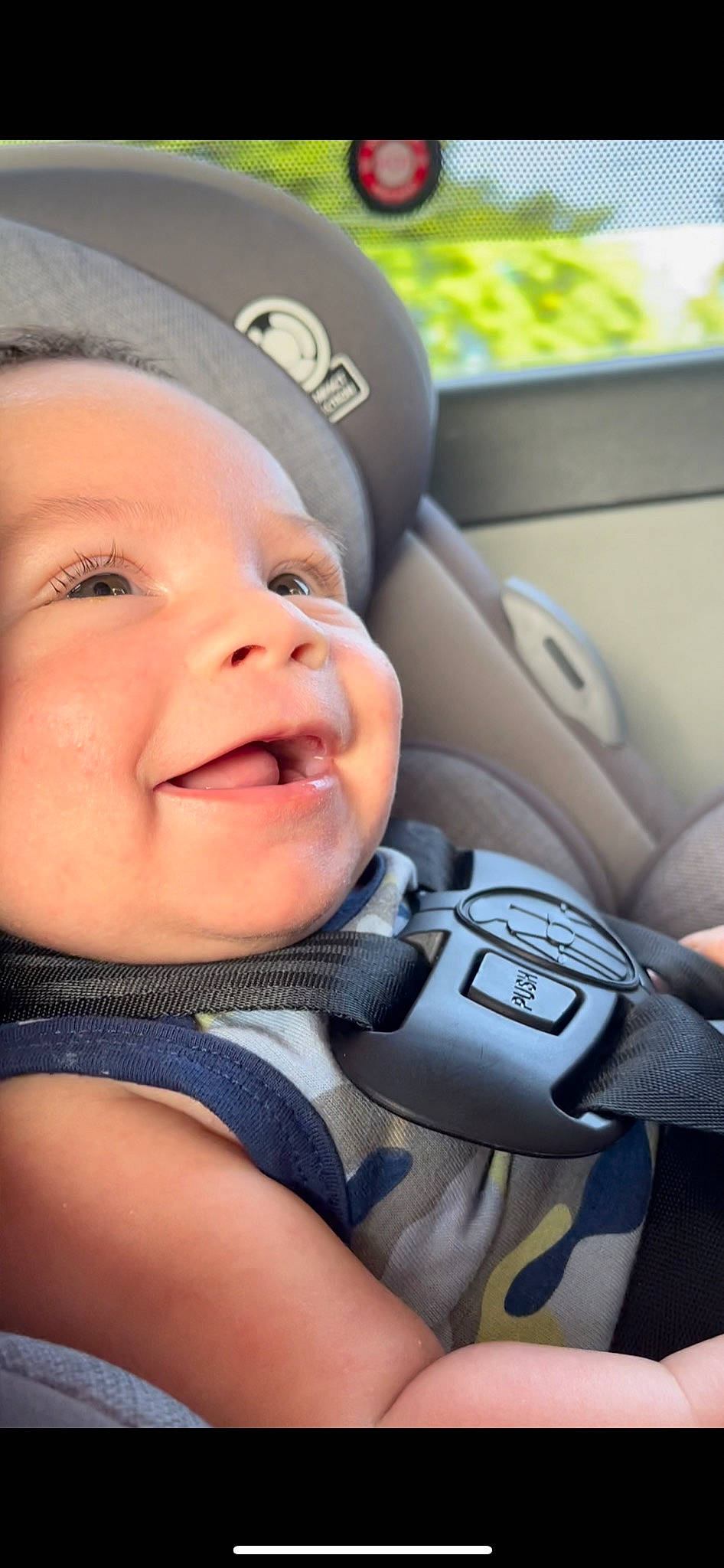 Estèban joined the competition — help win amazing prizes! auto_part, automotive_design, baby, baby_laughing, baby_toddler_clothing, car_seat, cheek, child, comfort, cool, fun, happy, hat, head_restraint, headwear, joy, motor_vehicle, person, skin, smile