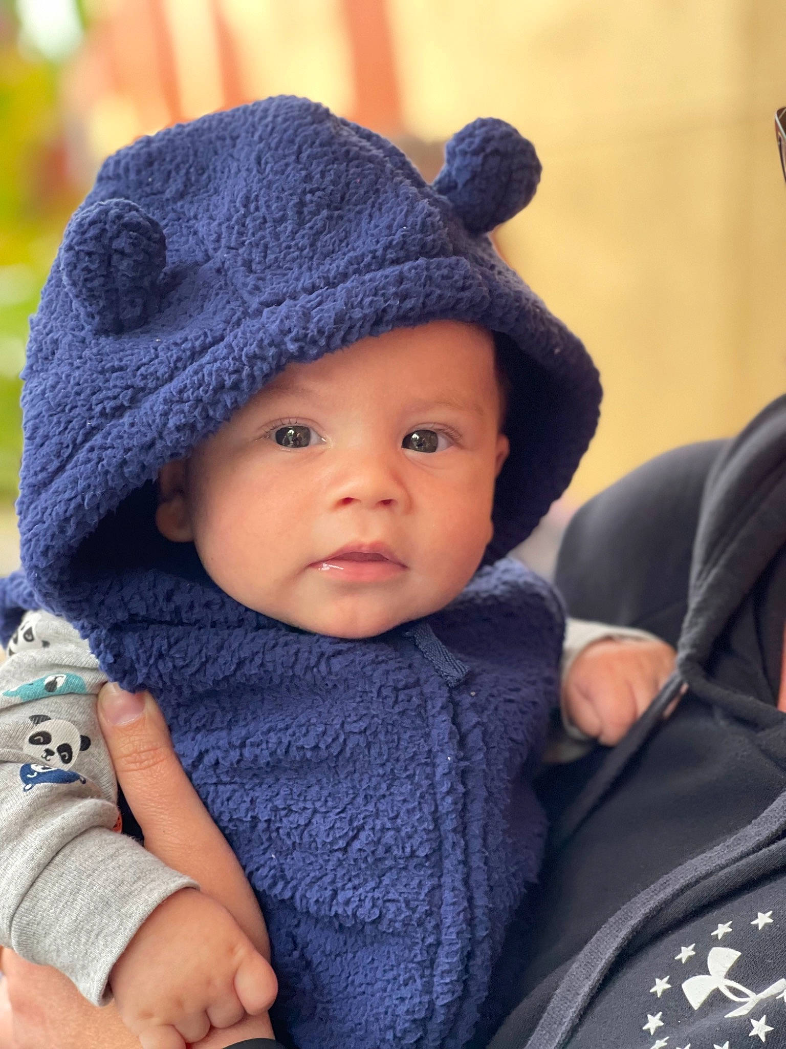 Estèban is registered to the contest to win money with this photo: baby, baby_toddler_clothing, beanie, cap, cheek, child, electric_blue, face, facial_expression, fashion_accessory, headgear, headwear, knit_cap, outerwear, person, skin, sleeve, street_fashion, toddler, winter