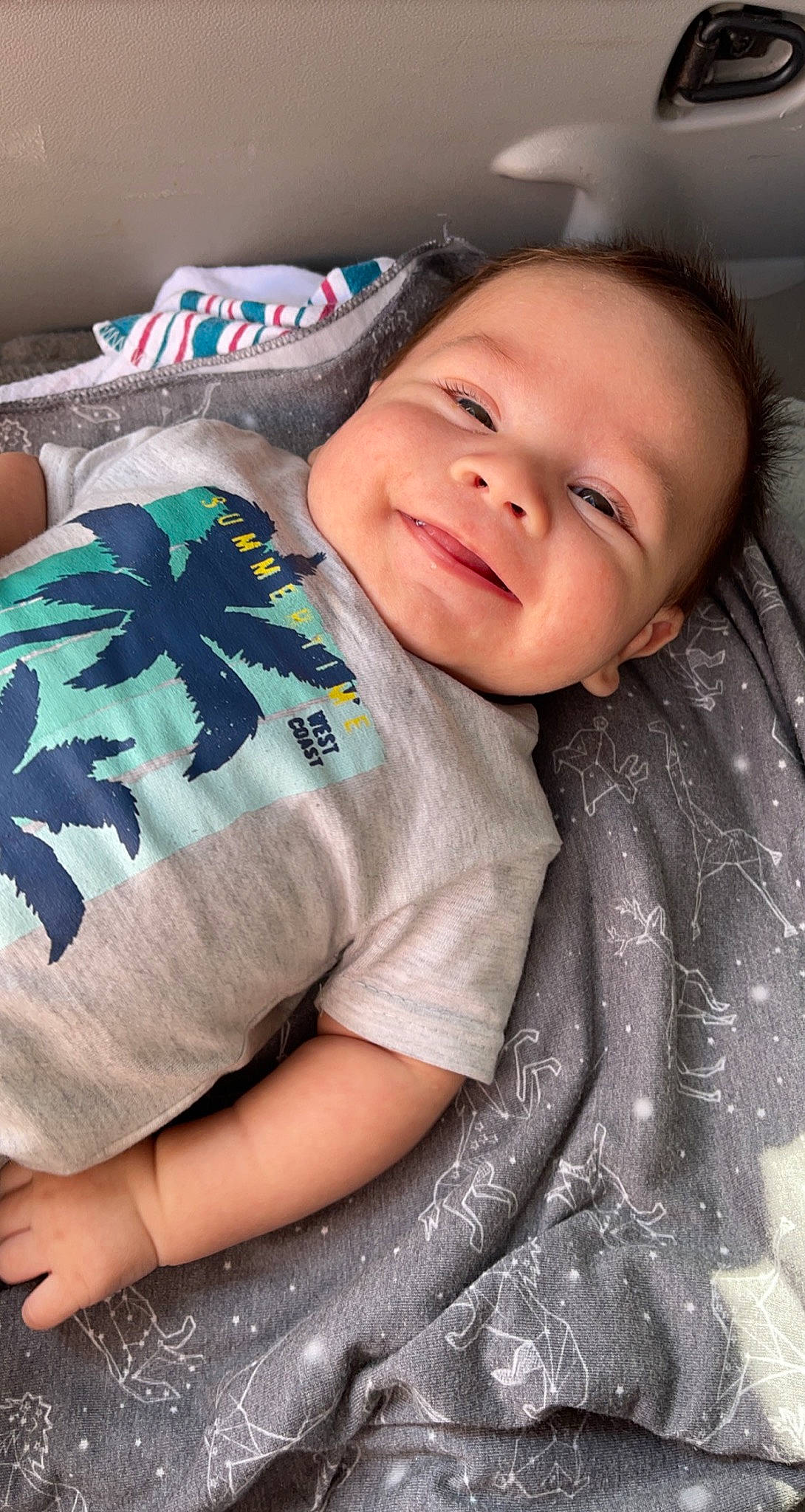 Estèban joined the competition — help win amazing prizes! cheek, child, comfort, elbow, eye, flash_photography, happy, iris, linens, lip, mouth, nose, pattern, person, sitting, skin, sleeve, smile, t_shirt, textile