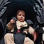 Irina participe au concours pour gagner de l'argent avec cette photo : accessories, baby, bed, bodypart, car, car_interior, carseat, clothing, cradle, crib, face, furniture, hat, head, infantbed, person, strap, stroller, transportation, vehicle