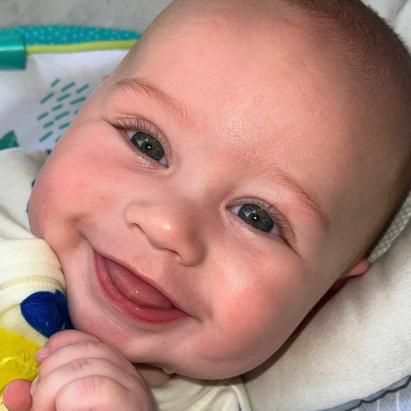 Lincoln joined the competition — help win amazing prizes! baby, babylaughing, bodypart, cushion, face, finger, hand, happy, head, homedecor, laughing, mouth, newborn, person, photography, portrait, quilt, selfie, smile, teeth
