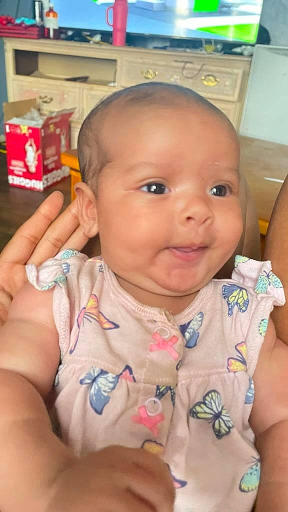 Aubriella is registered to the contest to win money with this photo: baby, cheek, chin, ear, eye, eyebrow, eyelash, face, facial_expression, forehead, hair, head, human_body, iris, lip, mouth, neck, nose, person, skin