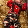 Malachi joined the competition — help win amazing prizes! baby, sleeping, christmas_pajamas, bow_tie, suspenders, basket, cushion, patterned, red_clothing, infant, face, peaceful, indoors, holiday_outfit, cute, child, portrait, resting, soft_lighting, cozy