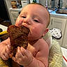 baby, child, closeup, cooking, cute, dining, eating, face, food, hands, highchair, indoor, infant, kitchen, meal, meat, messy, person, plump, steak