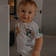 Mikey joined the competition — help win amazing prizes! black_pants, child, clothing, decoration, door, face, floor, hair, hand, home, indoor, light, mirror, room, smiling, standing, toddler, wall, white_tshirt, young_child