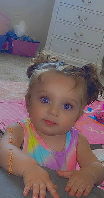 Elaine is registered to the contest to win money with this photo: blue, cabinetry, cheek, chin, ear, eyebrow, eyelash, forehead, happy, headgear, iris, lip, long_hair, mouth, neck, nose, person, pink, skin, summer