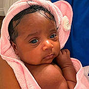 Novalee joined the competition — help win amazing prizes! baby, child, infant, pink_towel, towel, wrapped, cute, face, eyes, hand, skin, person, newborn, soft, indoors, portrait, holding, human, young, expression