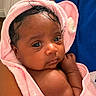 baby, child, infant, pink_towel, towel, wrapped, cute, face, eyes, hand, skin, person, newborn, soft, indoors, portrait, holding, human, young, expression