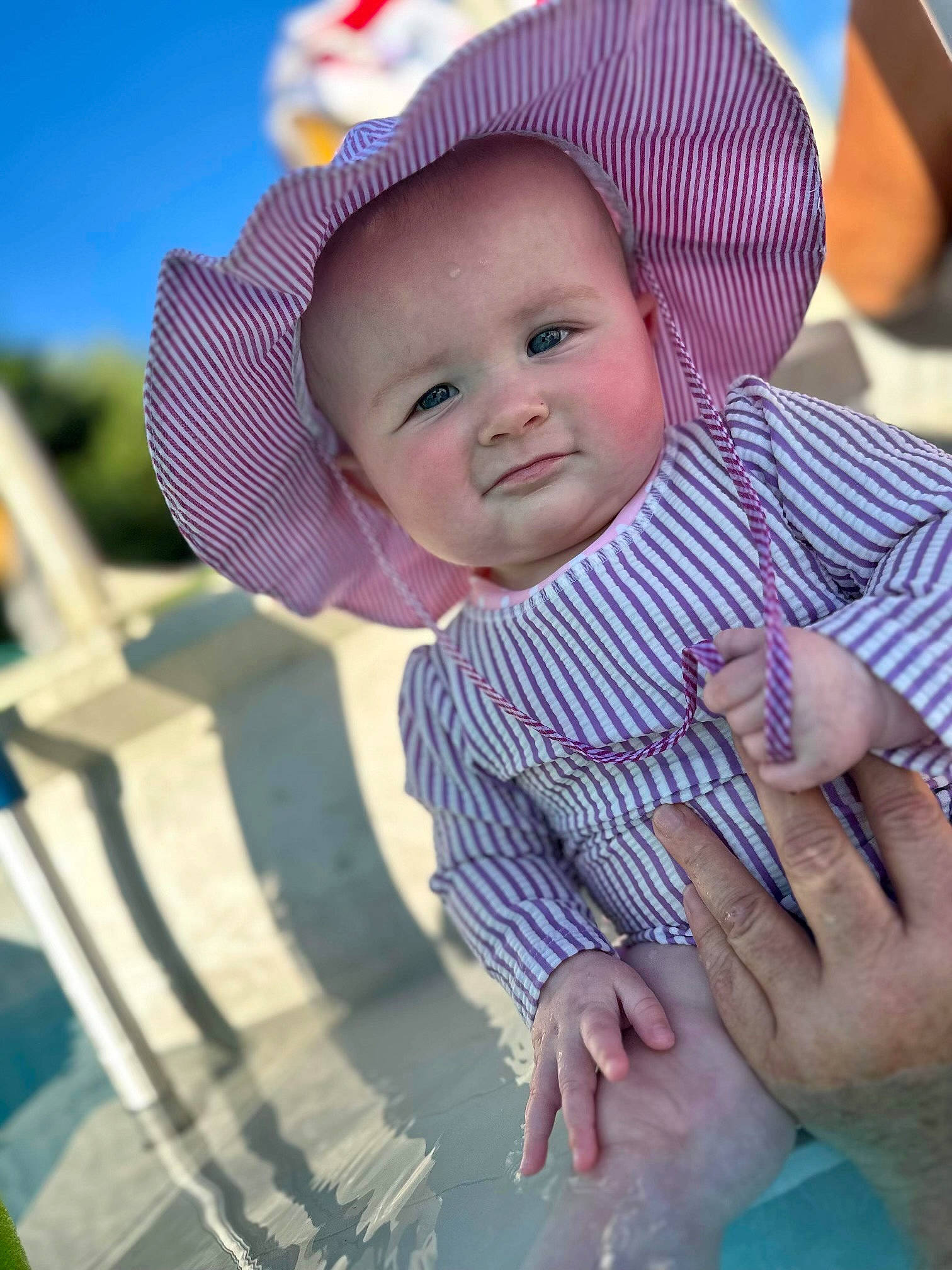 Emberleigh joined the competition — help win amazing prizes! baby, baby_toddler_clothing, cap, cheek, child, cool, eye, fun, gesture, grass, happy, hat, lip, mouth, nose, person, pink, skin, sun_hat, textile