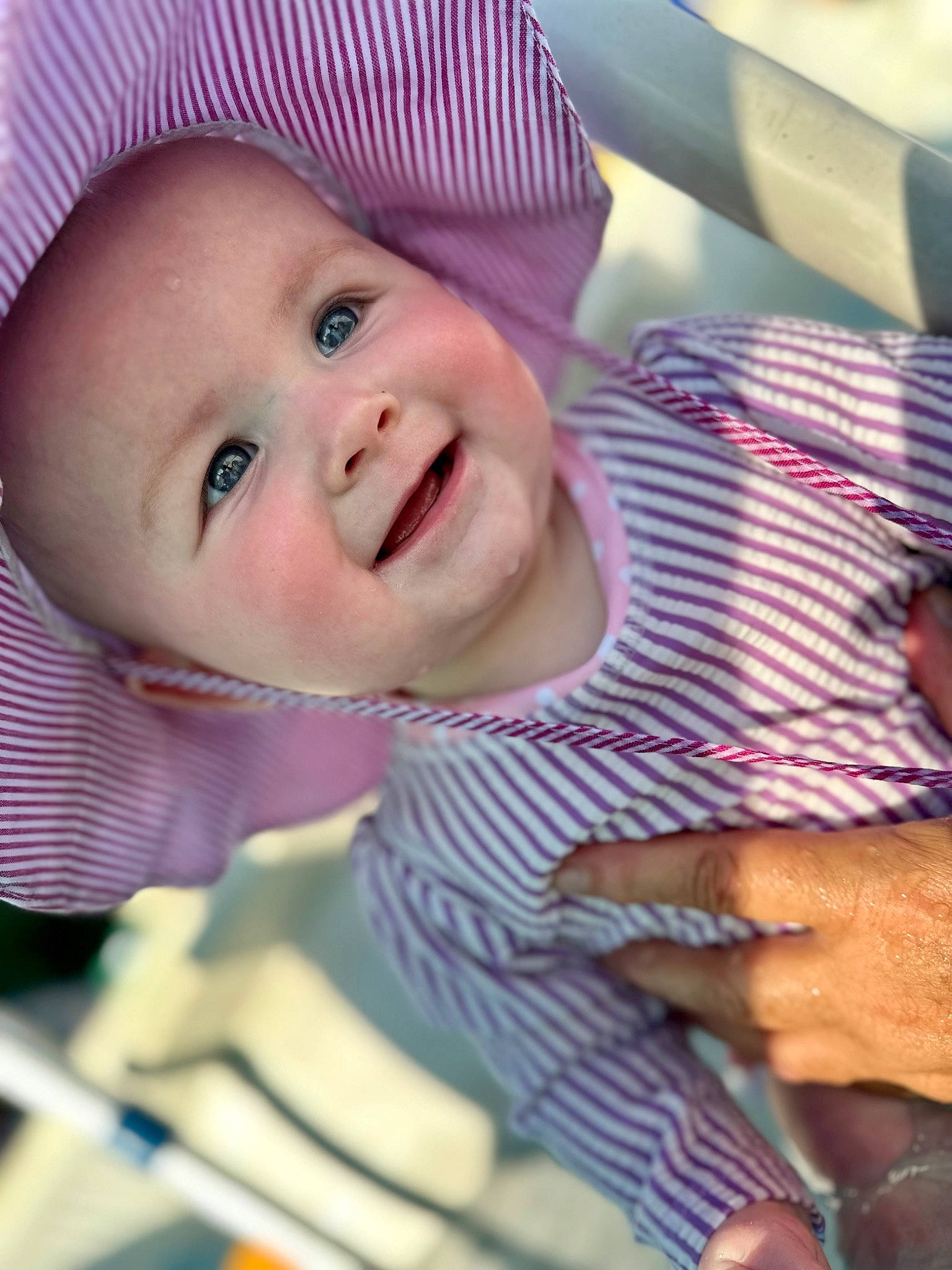 Emberleigh joined the competition — help win amazing prizes! baby, baby_laughing, baby_toddler_clothing, cap, cheek, child, eye, facial_expression, happy, iris, joy, lip, mouth, nose, organ, person, pink, product, purple, skin