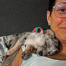 Coral Rae joined the competition — help win amazing prizes! bed, blanket, casual, closeup, companion, cute, dog, glasses, indoor, nap, person, pet, puppy, relaxed, resting, short_hair, shoulder, sleeping, smile, tattoo