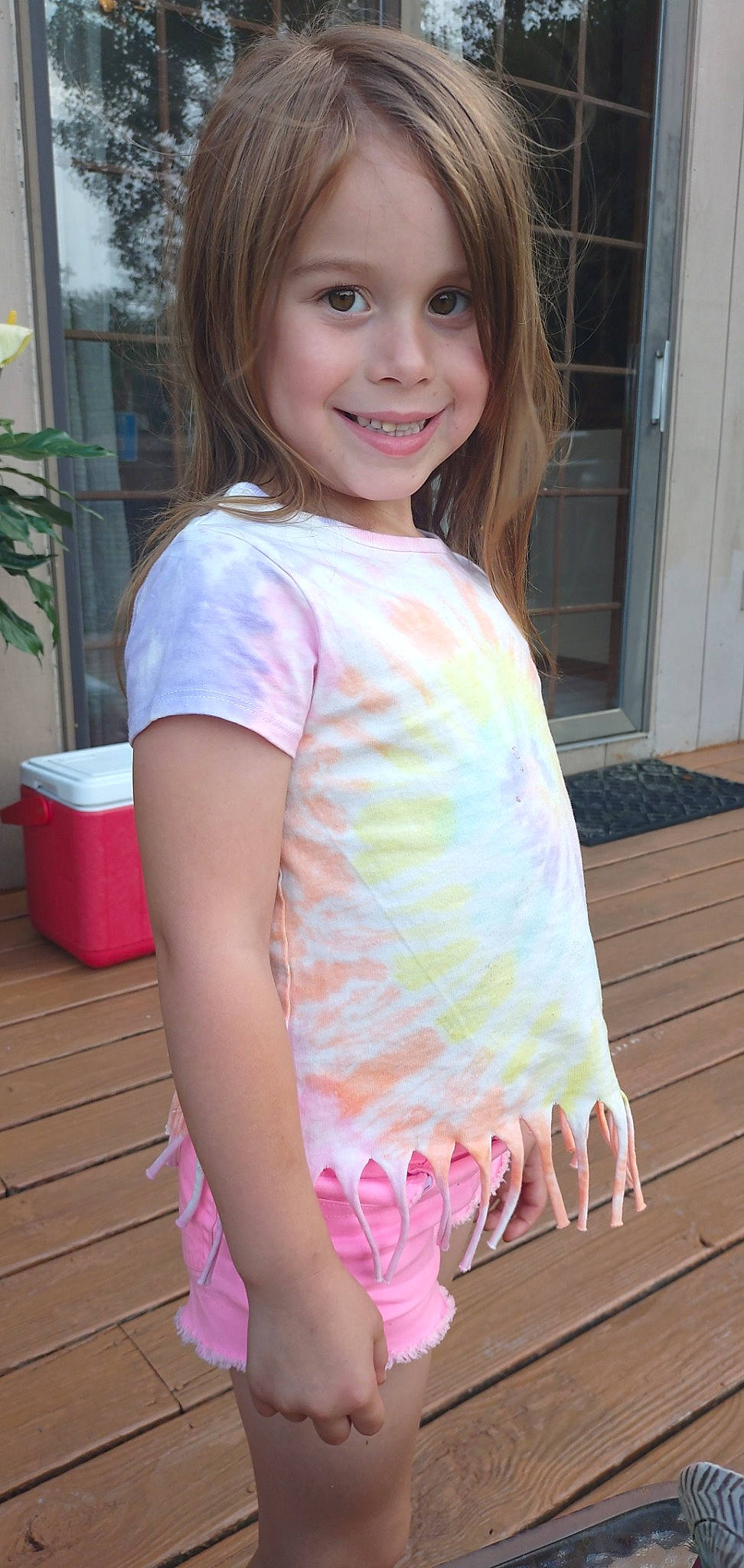 Paisley joined the competition — help win amazing prizes! chin, clothing, flowerpot, hair, happy, head, houseplant, iris, joy, neck, person, pink, plant, skin, sleeve, smile, standing, t_shirt, thigh, toddler