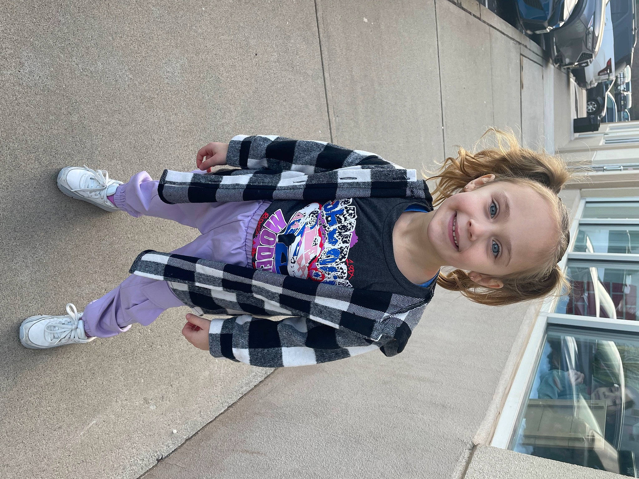 Antonia joined the competition — help win amazing prizes! asphalt, carmine, child, denim, electric_blue, fun, human_leg, joy, pattern, pedestrian, person, plaid, road_surface, sleeve, smile, sock, tartan, toddler, tree, walking_shoe