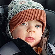 Francescu-Maria a rejoint le concours — aidez-le/la à gagner de superbes lots ! baby, blue_eyes, car_seat, child, close_up, clothing, cute, face, hat, indoors, infant, jacket, outerwear, pom_pom, portrait, seatbelt, toddler, warm, winter, winter_hat