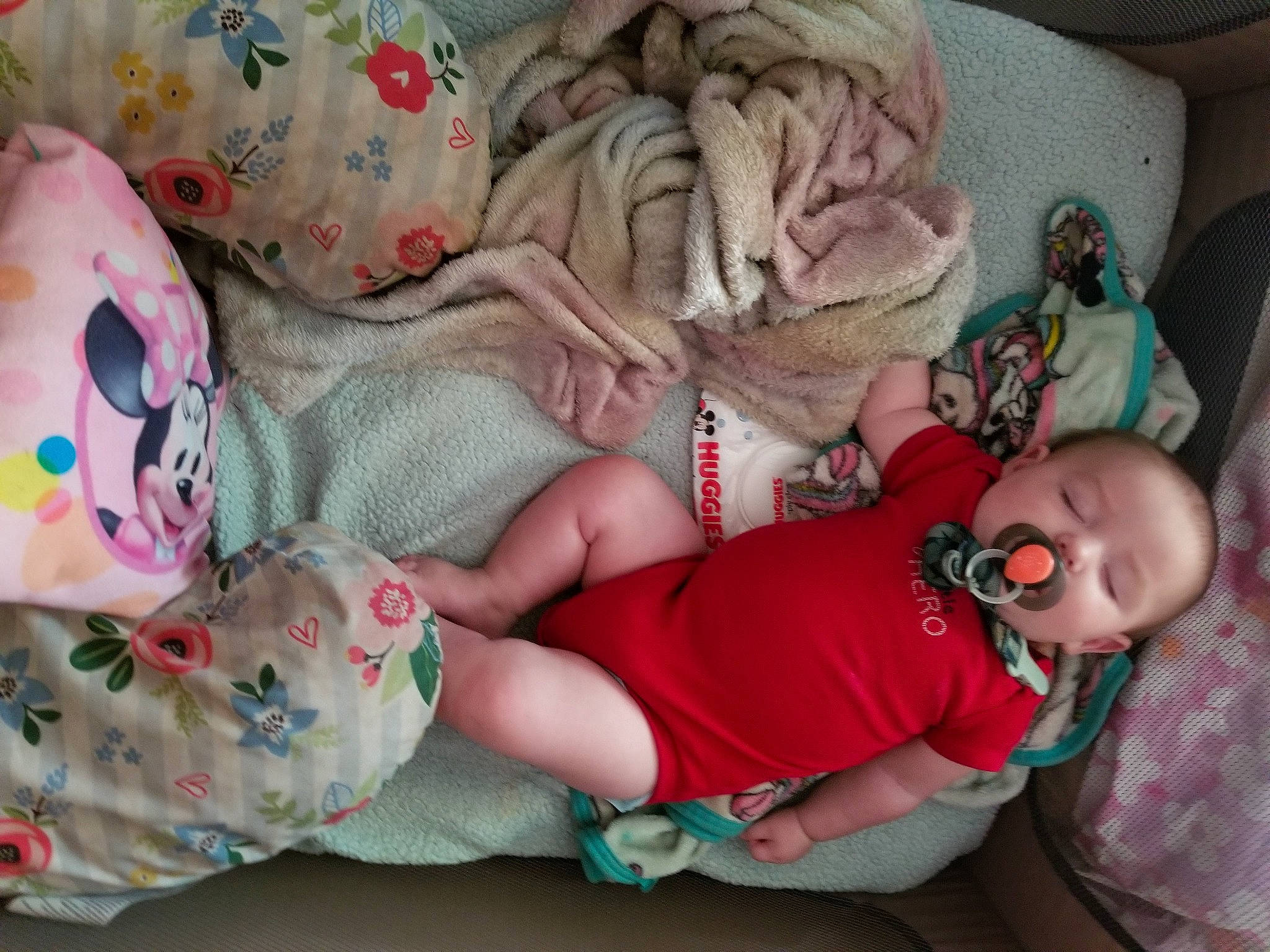 Joshua joined the competition — help win amazing prizes! arm, baby, baby_toddler_clothing, child, comfort, couch, doll, headgear, human_leg, lap, leg, linens, mouth, pattern, people, person, pink, skin, textile, thigh