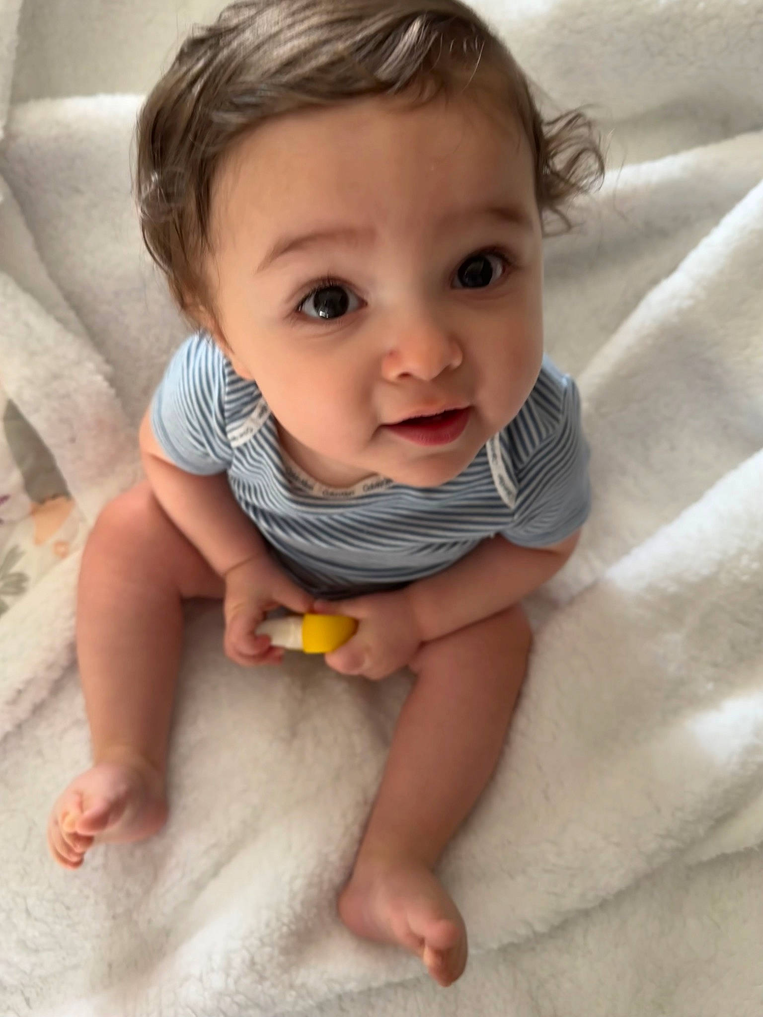 Benjamin is registered to the contest to win money with this photo: arm, baby_toddler_clothing, cheek, chin, eye, eyebrow, face, hair, hairstyle, hand, head, human_body, iris, leg, lip, mouth, neck, nose, person, skin