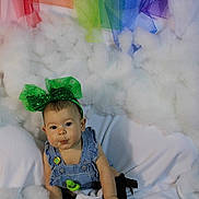 Odessa joined the competition — help win amazing prizes! baby, infant, child, headband, green_bow, bow, denim_overall, overalls, cloud_background, cotton, soft_background, sitting, portrait, cute, expression, studio_photo, button, green_accessory, blanket, smile