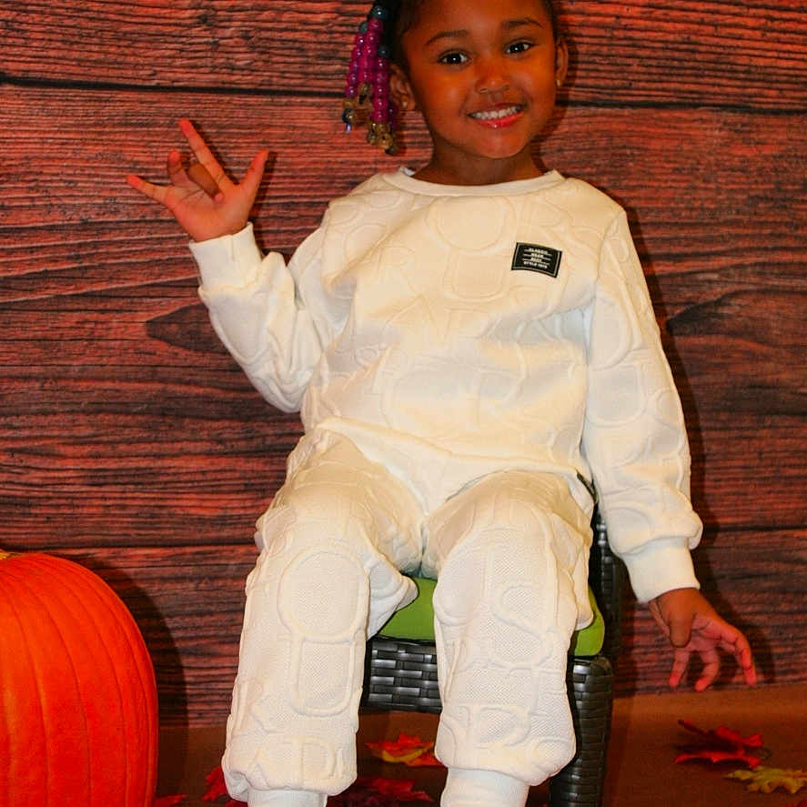 Deahni joined the competition — help win amazing prizes! bodypart, child, clothing, face, female, finger, food, footwear, girl, hand, head, pants, person, photography, plant, portrait, produce, shoe, sneaker, wood