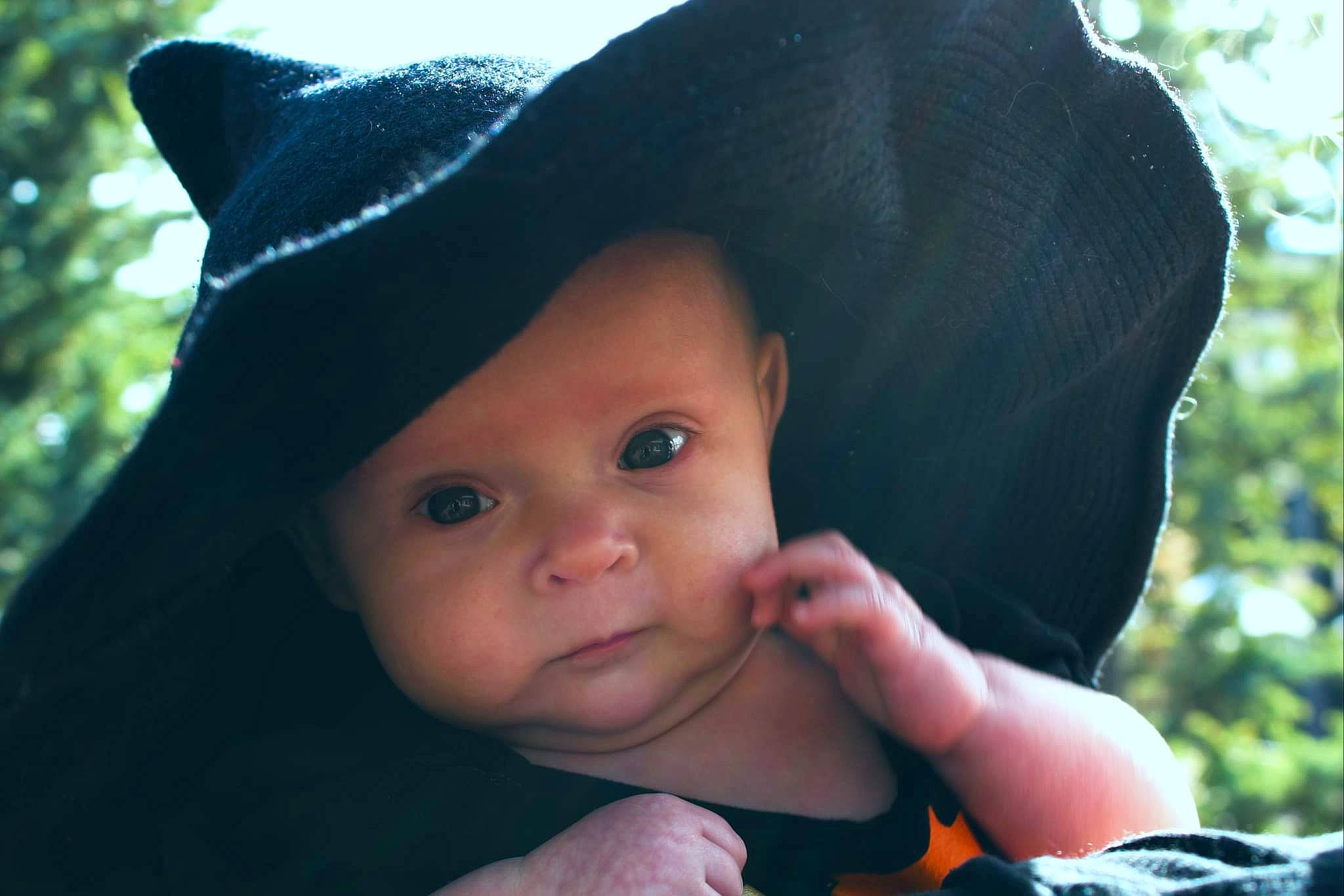 Ashlynn is registered to the contest to win money with this photo: baby, beauty, black_hair, cap, child, chin, eyelash, fun, gesture, grass, happy, hat, headgear, headwear, leaf, lip, nose, person, skin, sun_hat