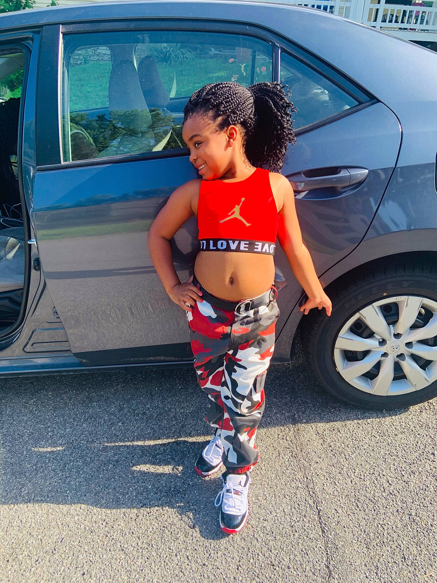 Ayanna is registered to the contest to win money with this photo: active_pants, car, family_car, human_leg, joy, muscle, person, photo_shoot, physical_fitness, recreation, sportswear, street_fashion, textile, trousers, vehicle, vehicle_door, yoga_pant