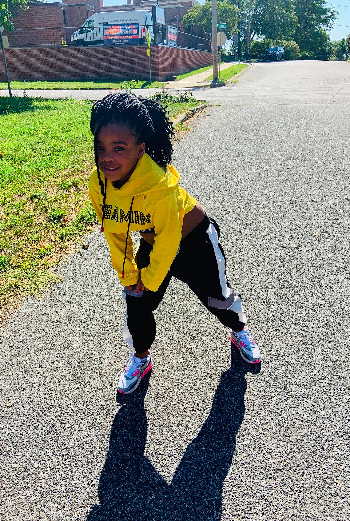 Ayanna joined the competition — help win amazing prizes! asphalt, car, child, fun, joy, person, play, recreation, running, shadow, smile, toddler, vacation, vehicle, yellow